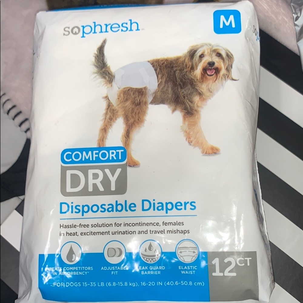Female disposable dog diapers . Used one so 11CT
